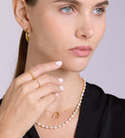 Twisted Hoop Earrings in Gold