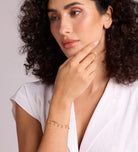 Dangling Dotted Bracelet in Gold