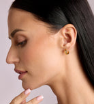 Bold Huggie Hoops in Gold