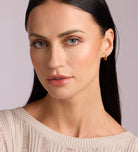 Tube Huggie Hoops in Gold