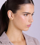 Tube Huggie Hoops in Gold