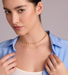 Dangling Dotted Choker in Gold