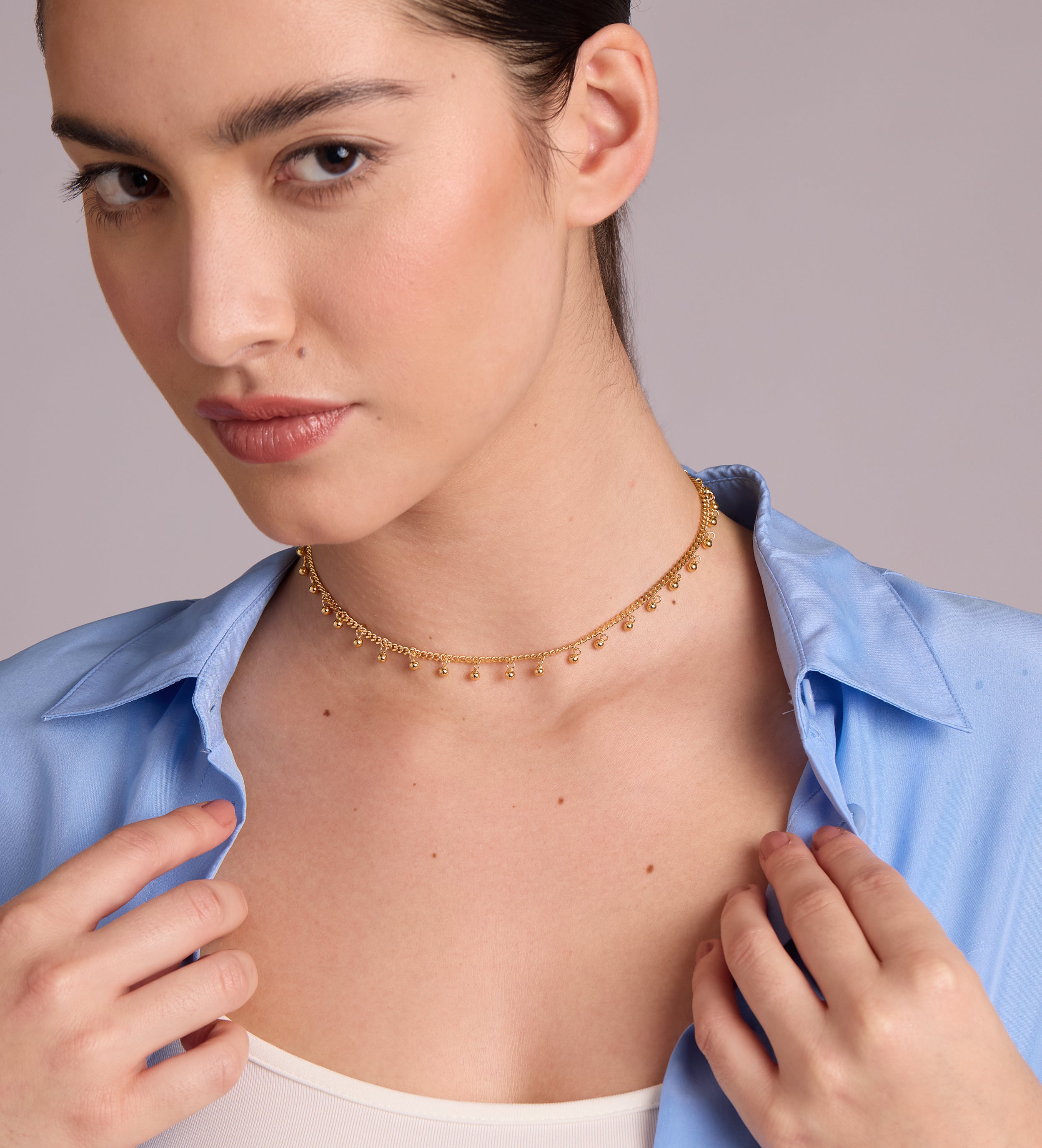 Dangling Dotted Choker in Gold