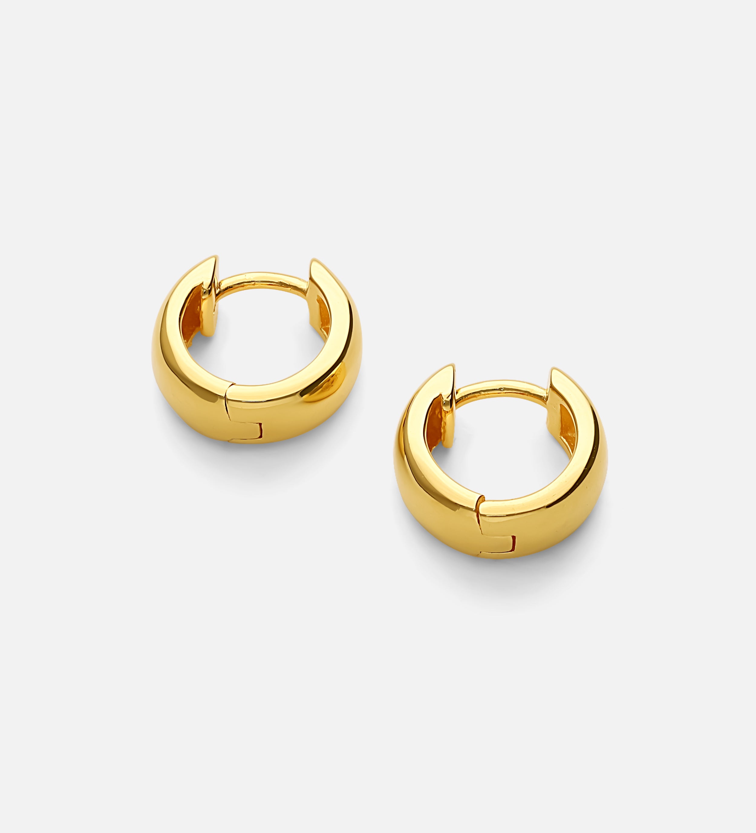 Bold Huggie Hoops in Gold