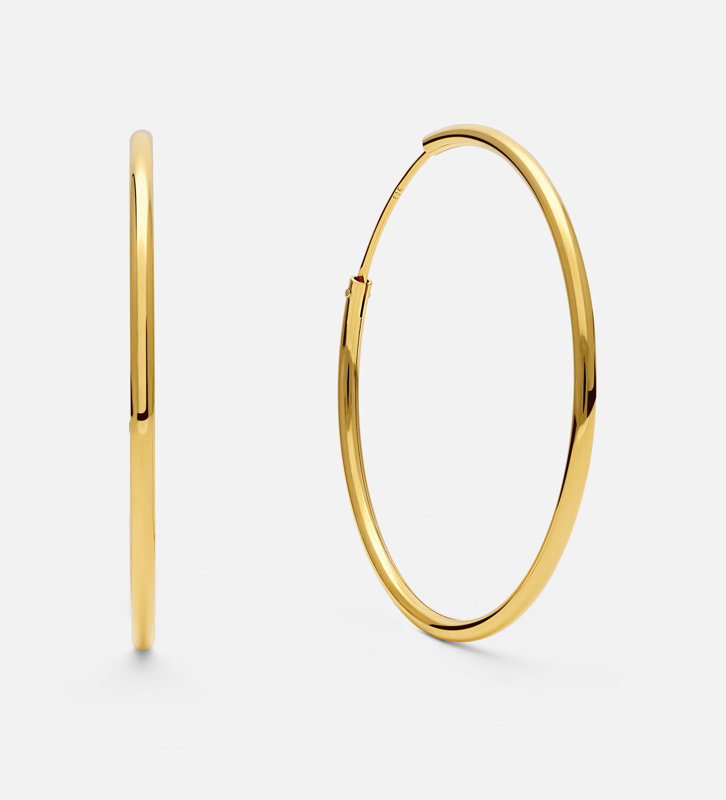 Thin Oversized Hoops in Gold