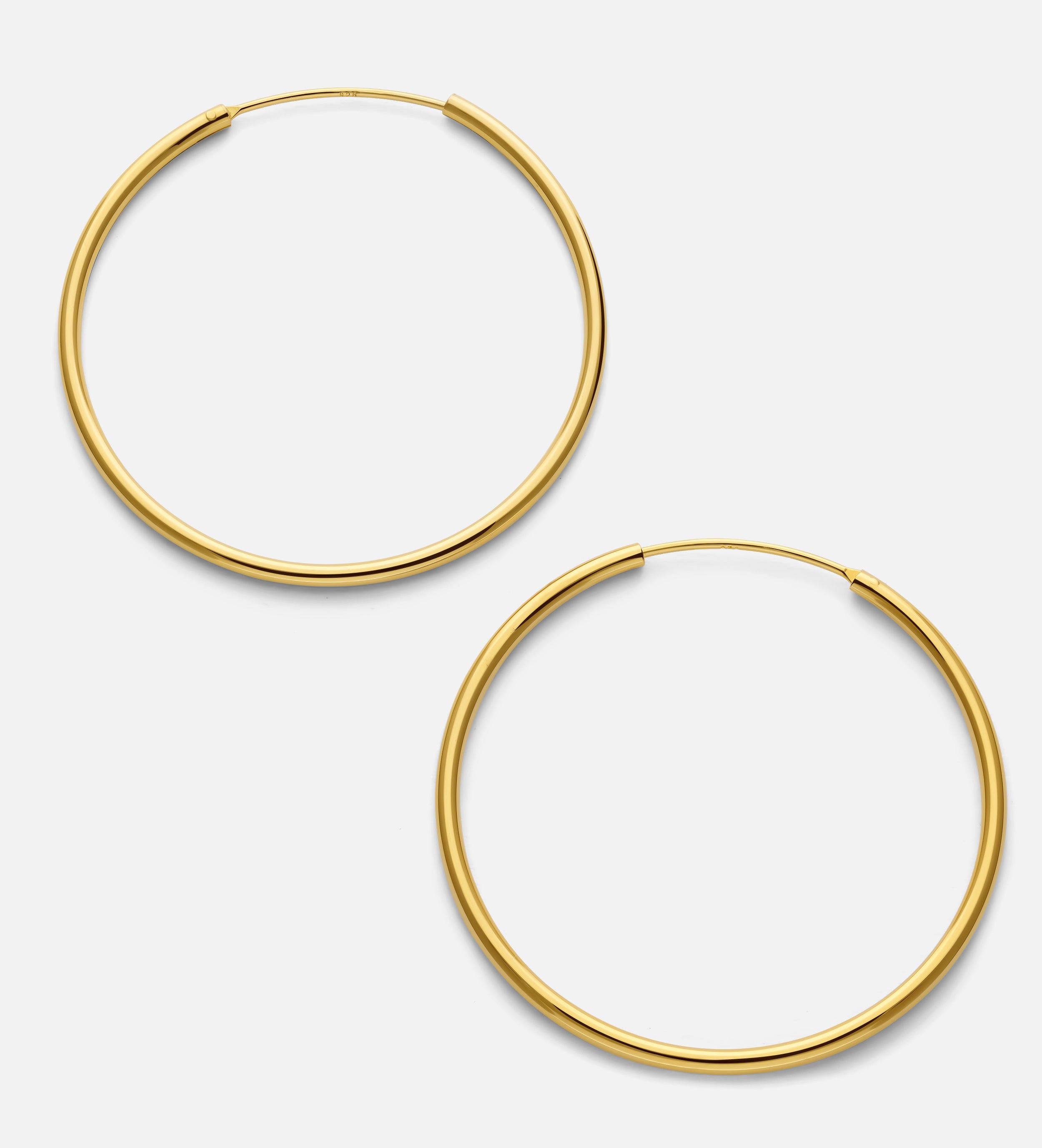 Thin Oversized Hoops in Gold