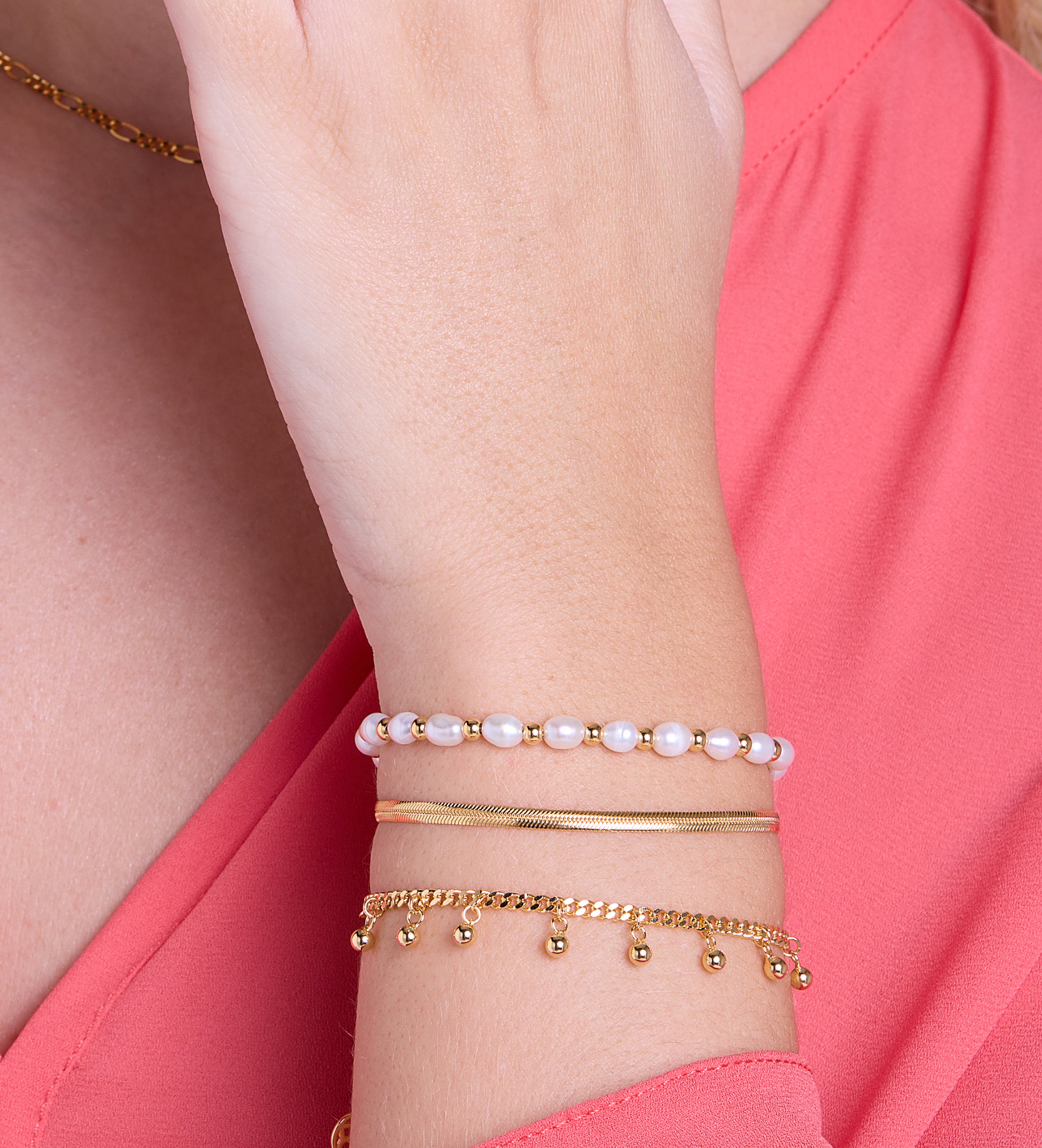 Dangling Dotted Bracelet in Gold