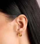 Bold Huggie Hoops in Gold