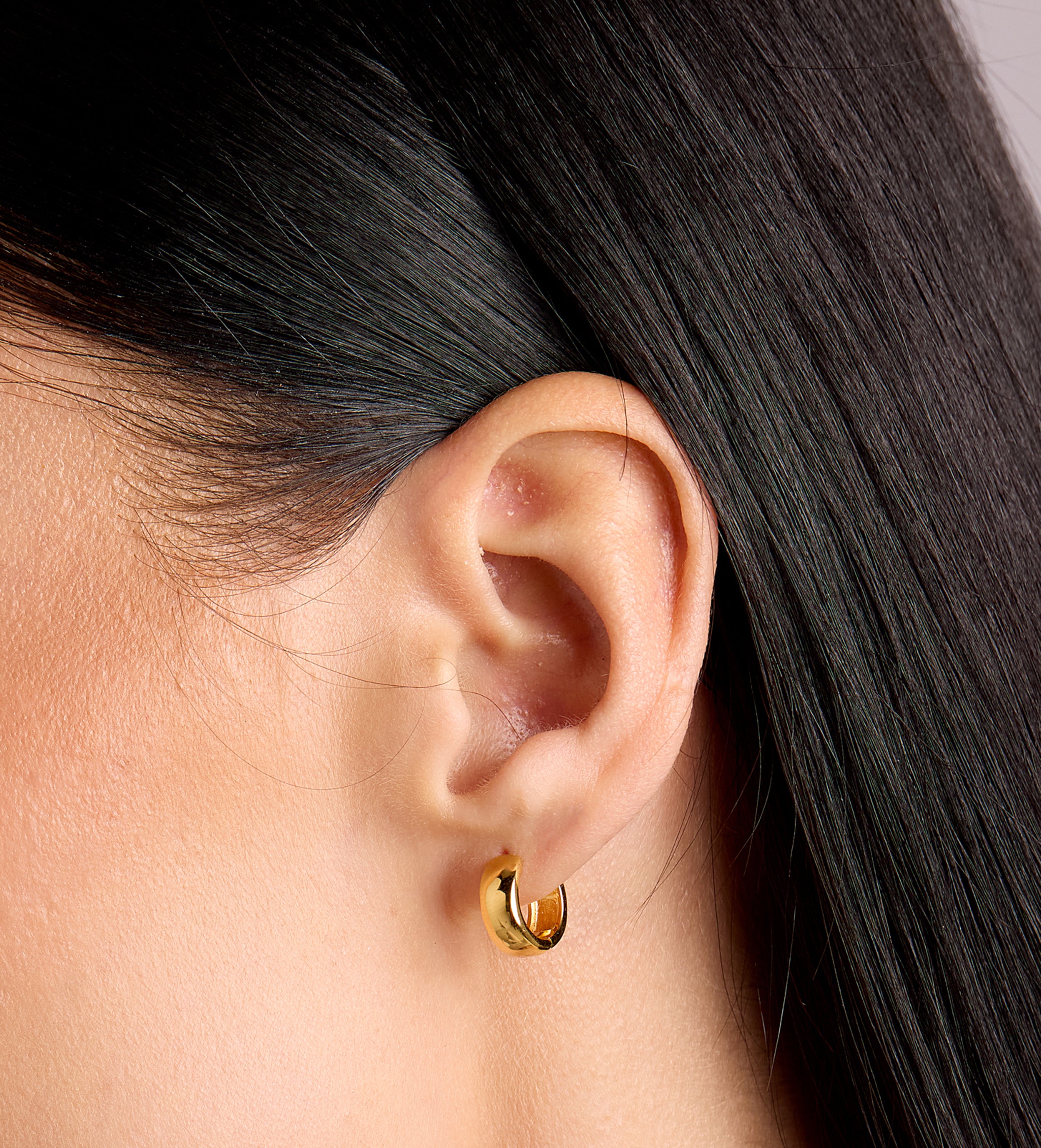 Bold Huggie Hoops in Gold