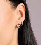 Tube Huggie Hoops in Silver