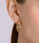 Twisted Hoop Earrings in Gold