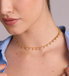 Dangling Dotted Choker in Gold