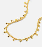 Dangling Dotted Choker in Gold