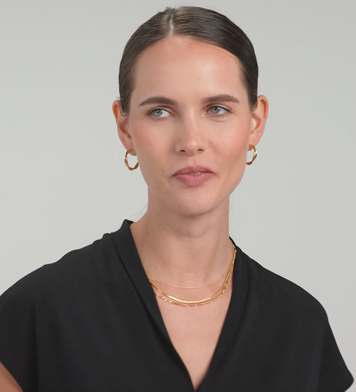 Twisted Hoop Earrings in Gold