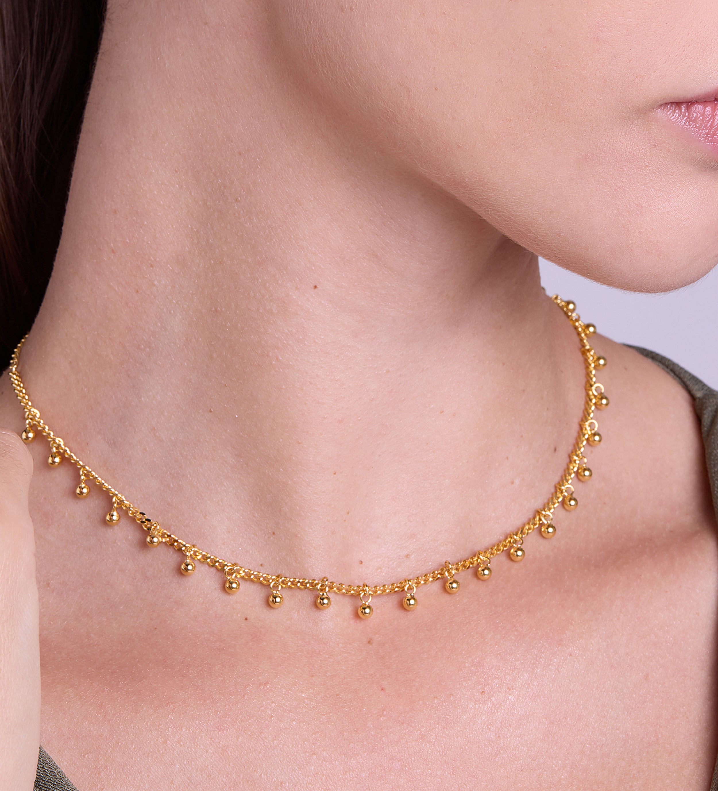 Dangling Dotted Choker in Gold